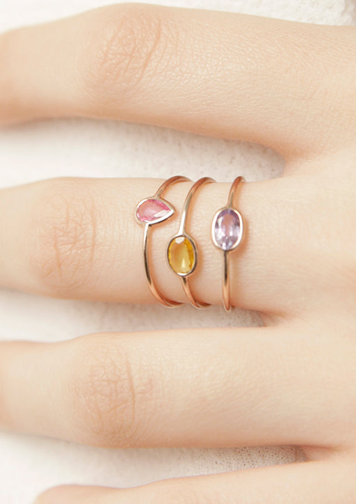 ROSE CUT SAPPHIRE TRIO - THREE RING SET-Rings-A trio of delicate pastel colored rings, with pear and oval shaped sapphires. Wear one alone, stack them together or wear on separate fingers for a fun look. Shown here in rose gold and black gold. - available in 14k yellow, rose and black gold - multicolor sapphires: approximately 0.75 total carat weight; AAA quality - sapphire colors and shapes may vary slightly as they are individually sourced - shown on model in rose gold and black gold - custom 