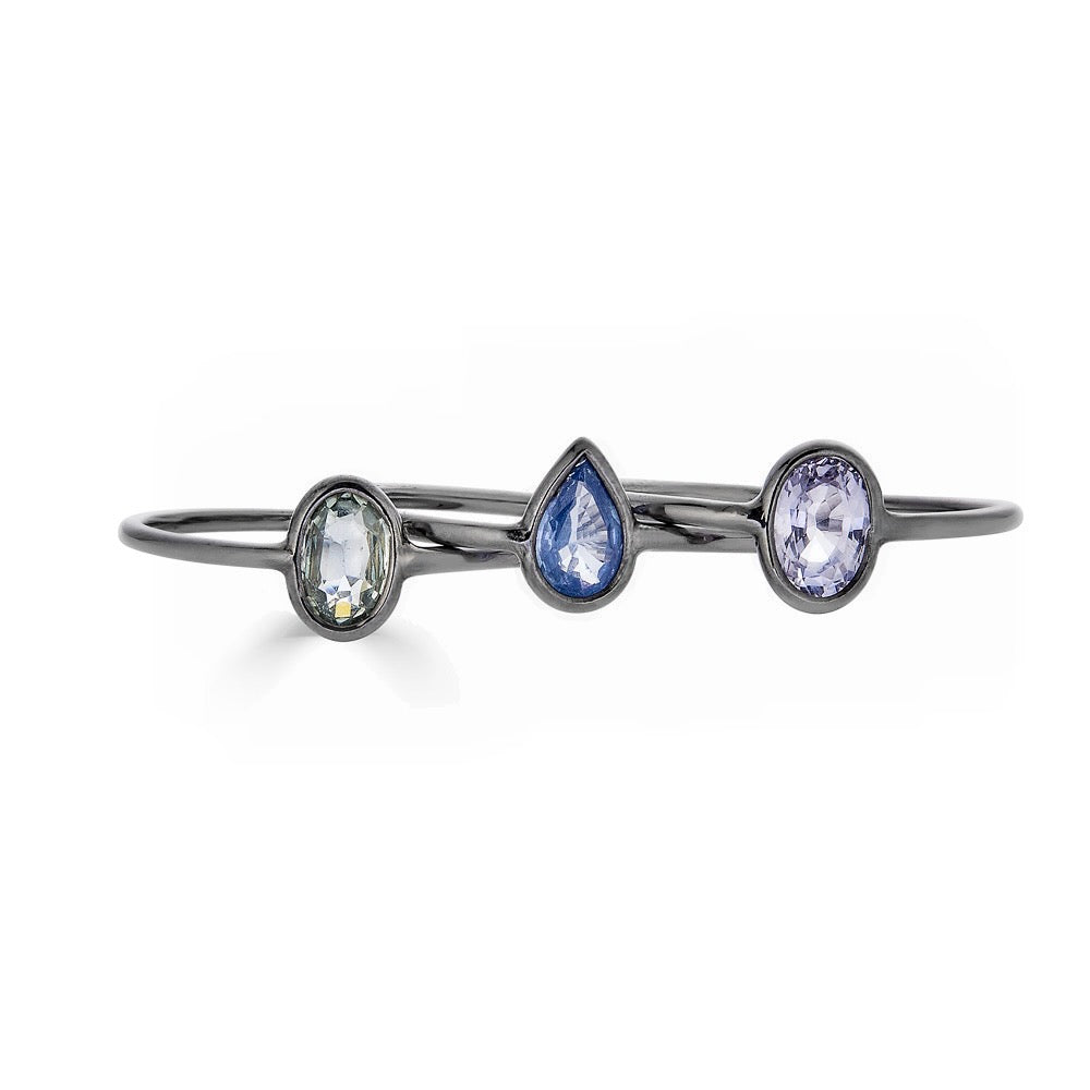 ROSE CUT SAPPHIRE TRIO - THREE RING SET-Rings-A trio of delicate pastel colored rings, with pear and oval shaped sapphires. Wear one alone, stack them together or wear on separate fingers for a fun look. Shown here in rose gold and black gold. - available in 14k yellow, rose and black gold - multicolor sapphires: approximately 0.75 total carat weight; AAA quality - sapphire colors and shapes may vary slightly as they are individually sourced - shown on model in rose gold and black gold - custom 